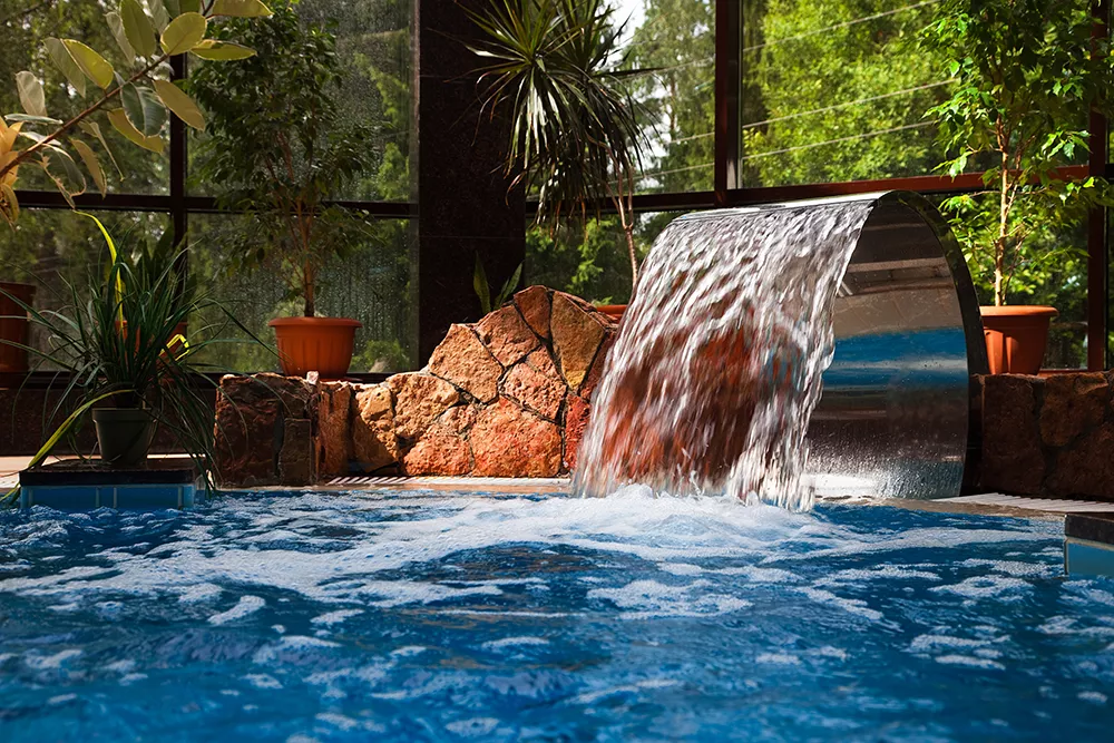Cascata tonda in acciaio piscina - Piscina con cascata - Baires Piscine