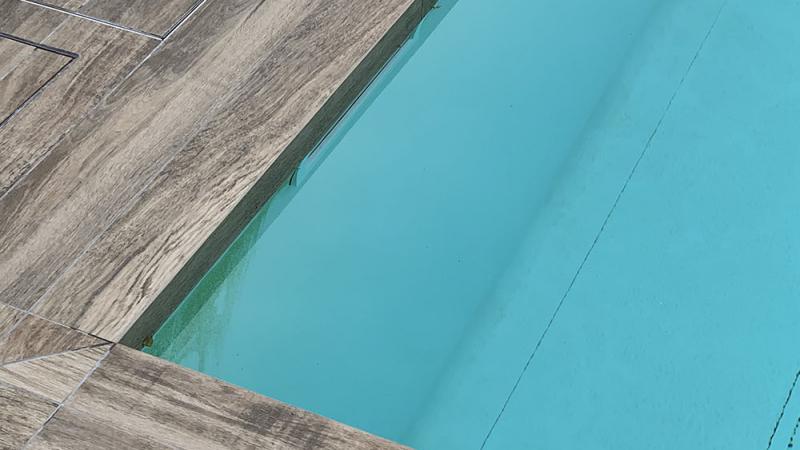 Piscina a Sfioro: Grey Woods - Baires Piscine Brescia Bergamo Milano