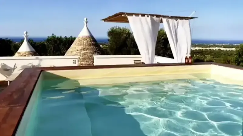 REBEA TRULLI HOME - area relax bordo piscina - Baires Piscine