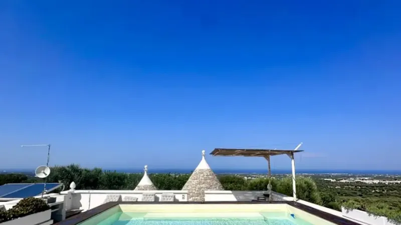 REBEA TRULLI HOME - area relax bordo piscina - Baires Piscine